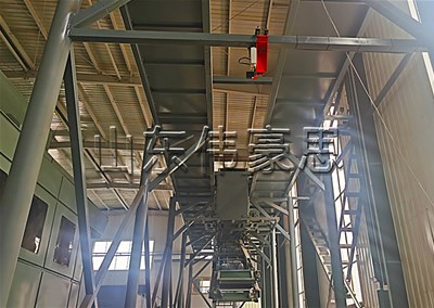 水泥袋全自動裝車系統(tǒng)，高速自動裝車機使用現(xiàn)場